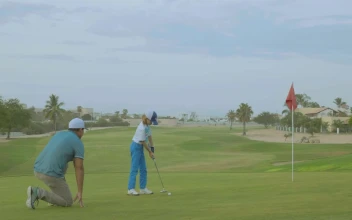 Stock Video A Man Teaching His Son How To Play Golf For PC
