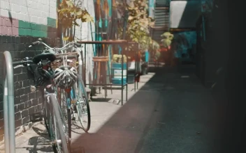 Stock Video A Man Takes A Bicycle From Bike Parking For PC