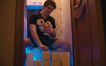 Stock Video A Man Sitting On The Toilet Making A Toilet Paper For PC
