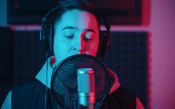 Stock Video A Man Singing To A Professional Microphone For PC