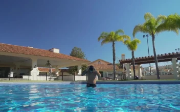 Stock Video A Man Prepares To Swim For PC