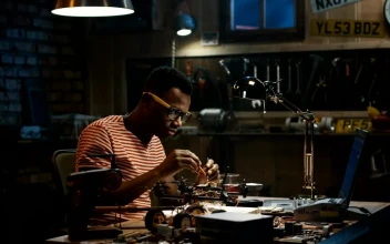 Stock Video A Man In Glasses Is Repairing A Drone For PC