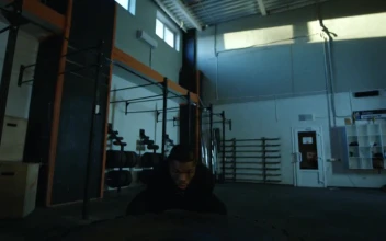 Stock Video A Man Flipping A Big Tire In The Gym For PC