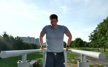 Stock Video A Man Doing Exercise In The Park For PC
