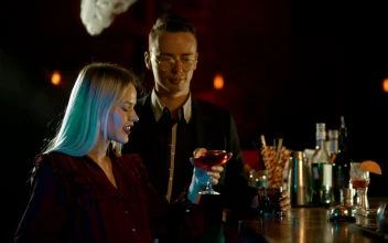 Stock Video A Man And A Woman Chatting At A Bar Counter For PC