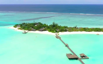 Stock Video A Luxury Tourist Island With A Pier And Bungalows For PC