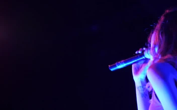 Stock Video A Long Haired Woman Singing On Stage For PC