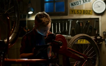 Stock Video A Little Boy Is Repairing His Bike With Tutorial For PC