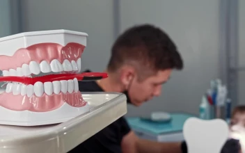 Stock Video A Little Boy Having Treatment With The Dentist For PC