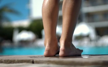Stock Video A Kid Jumps Into The Pool For PC