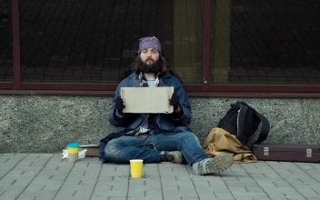 Stock Video A Homeless Guy Holding A Sign For PC
