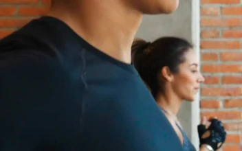 Stock Video A Healthy Couple Running On A Treadmill For PC