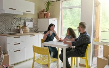 Stock Video A Happy Family Having A Breakfast For PC