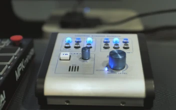 Stock Video A Hand Playing Music With A Midi Controller For PC