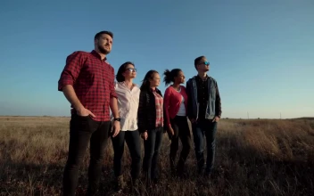 Stock Video A Group Of Friends Standing In The Countryside For PC