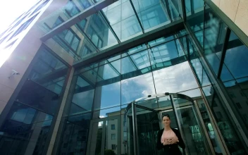 Stock Video Business Woman Takes A Break Outside The Office For PC