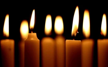 Stock Video Burning Candles In The Dark Close Up For PC
