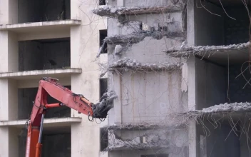 Stock Video Bulldozer Mechanical Arm Destroying The Building For PC