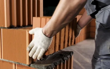 Stock Video Building A Brick Wall For PC