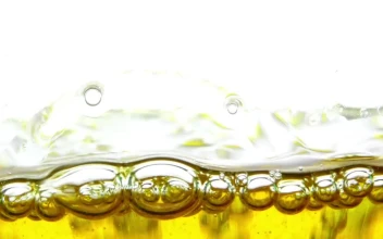 Stock Video Bubbles In Oil On White Background For PC