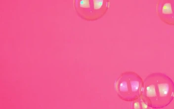 Stock Video Bubbles Floating On A Pink Background For PC