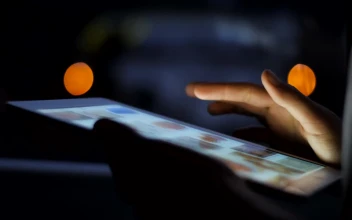 Stock Video Browsing The Web On A Tablet At Night For PC