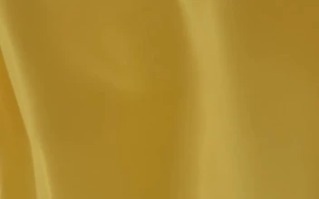 Stock Video Bright Yellow Fabric Waving For PC