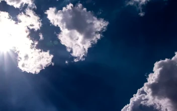 Stock Video Bright Sunshine Hidden Behind A Cloud For PC