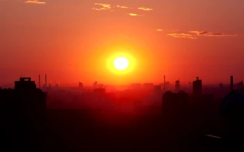 Stock Video Bright Sunrise Blurred Against The City For PC