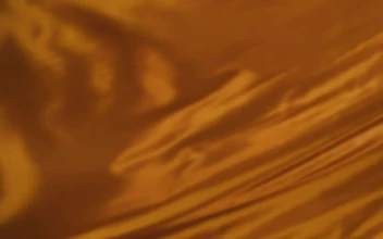 Stock Video Bright Orange Fabric Texture Moving For PC