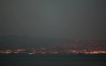 Stock Video Bright Lights From Coastal Buildings For PC