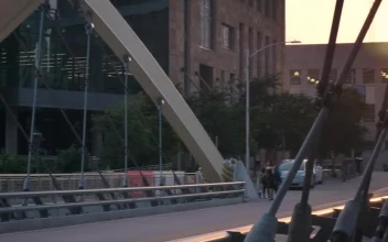 Stock Video Bridge Of Cars And People In The City At Sunset For PC