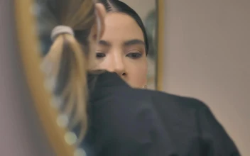 Stock Video Bride In Front Of The Mirror While Being Made Up For PC
