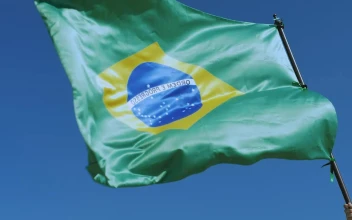 Stock Video Brazilian Flag Waving On Top Of A Flagpole For PC