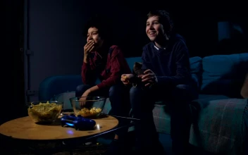 Stock Video Boys Eating Popcorn While Watching Tv For PC