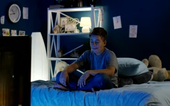 Stock Video Boy Watching A Funny Show On The Tv Late At For PC