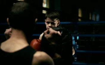 Stock Video Boy Training Boxing On The Ring For PC
