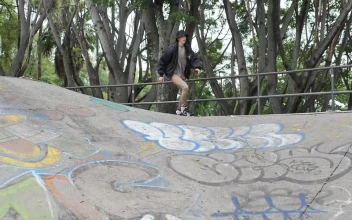 Stock Video Boy Sliding On Roller Skates Down A Ramp In A For PC