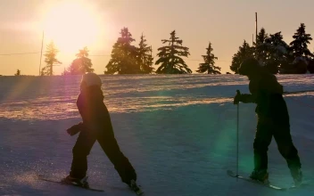 Stock Video Boy Skiing During Sunrise For PC