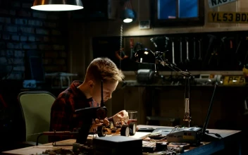 Stock Video Boy Repairing An Rc Car In The Garage For PC