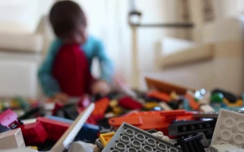 Stock Video Boy Pulling A Lot Of Legos To The Floor While For PC