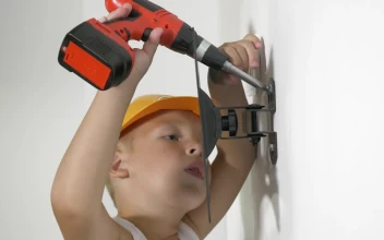 Stock Video Boy Playing With A Toy Drill For PC