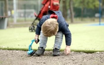 Stock Video Boy Playing With A Toy Construction Truck For PC