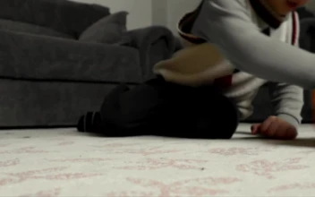 Stock Video Boy Playing With A Cart On The Floor Of A For PC