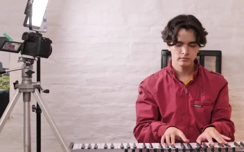 Stock Video Boy Playing Piano Being Recorded For PC