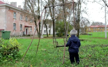 Stock Video Boy Playing On An Old Swing For PC