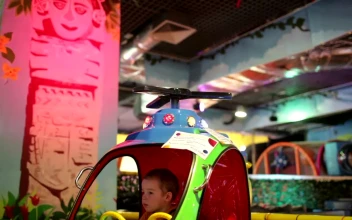 Stock Video Boy Playing At An Arcade For PC