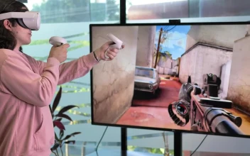 Stock Video Boy Playing A Vr Shooting Game For PC
