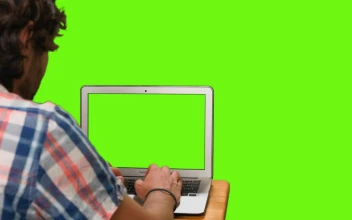 Stock Video Boy On His Computer With Green Screen On A Chroma For PC