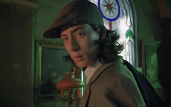 Stock Video Boy Modeling Old Style In A Suit And Coat For PC